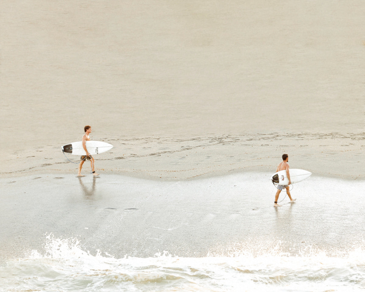 Surfers Walking Oh The Beach